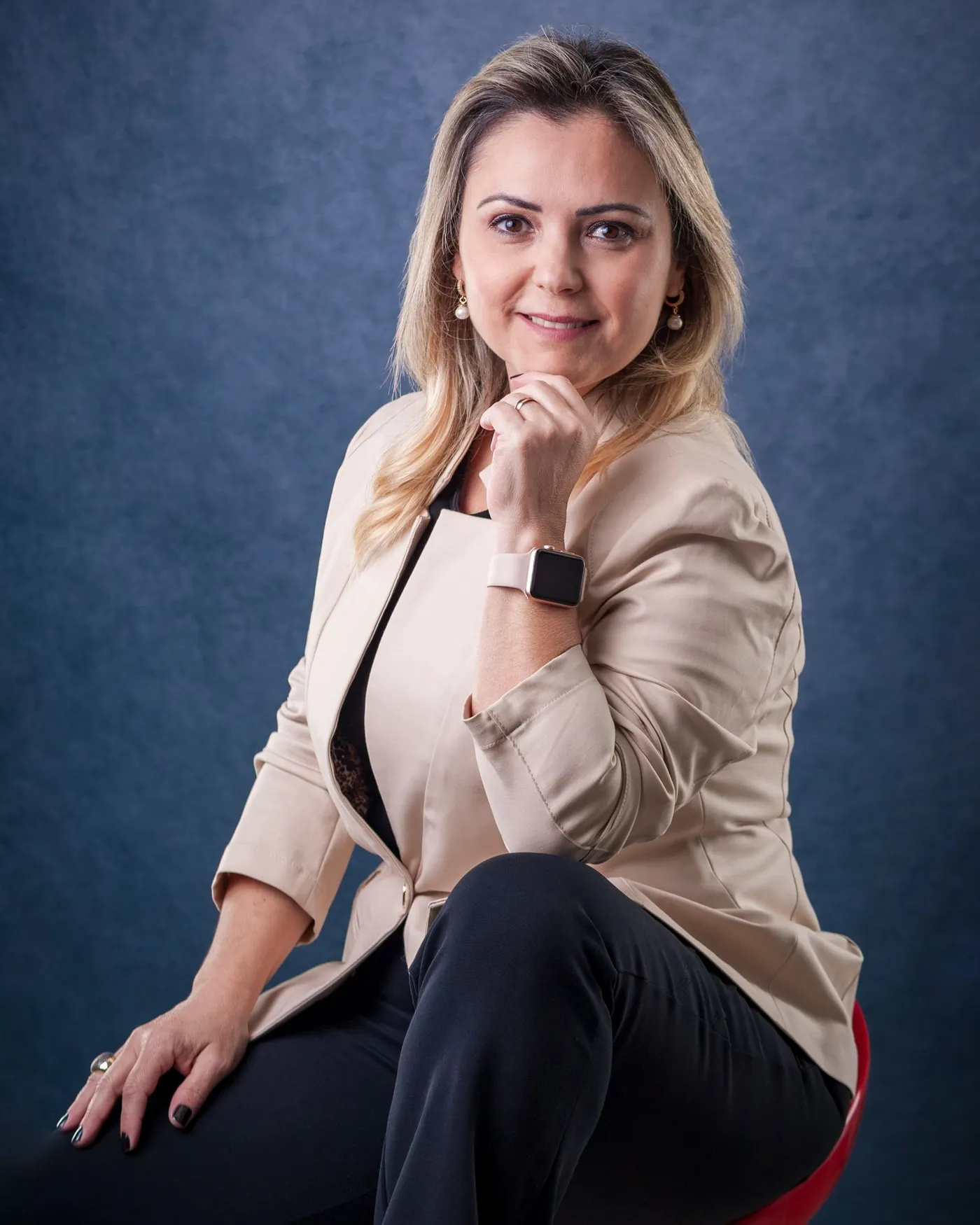 Woman wearing a tailored beige blazer
