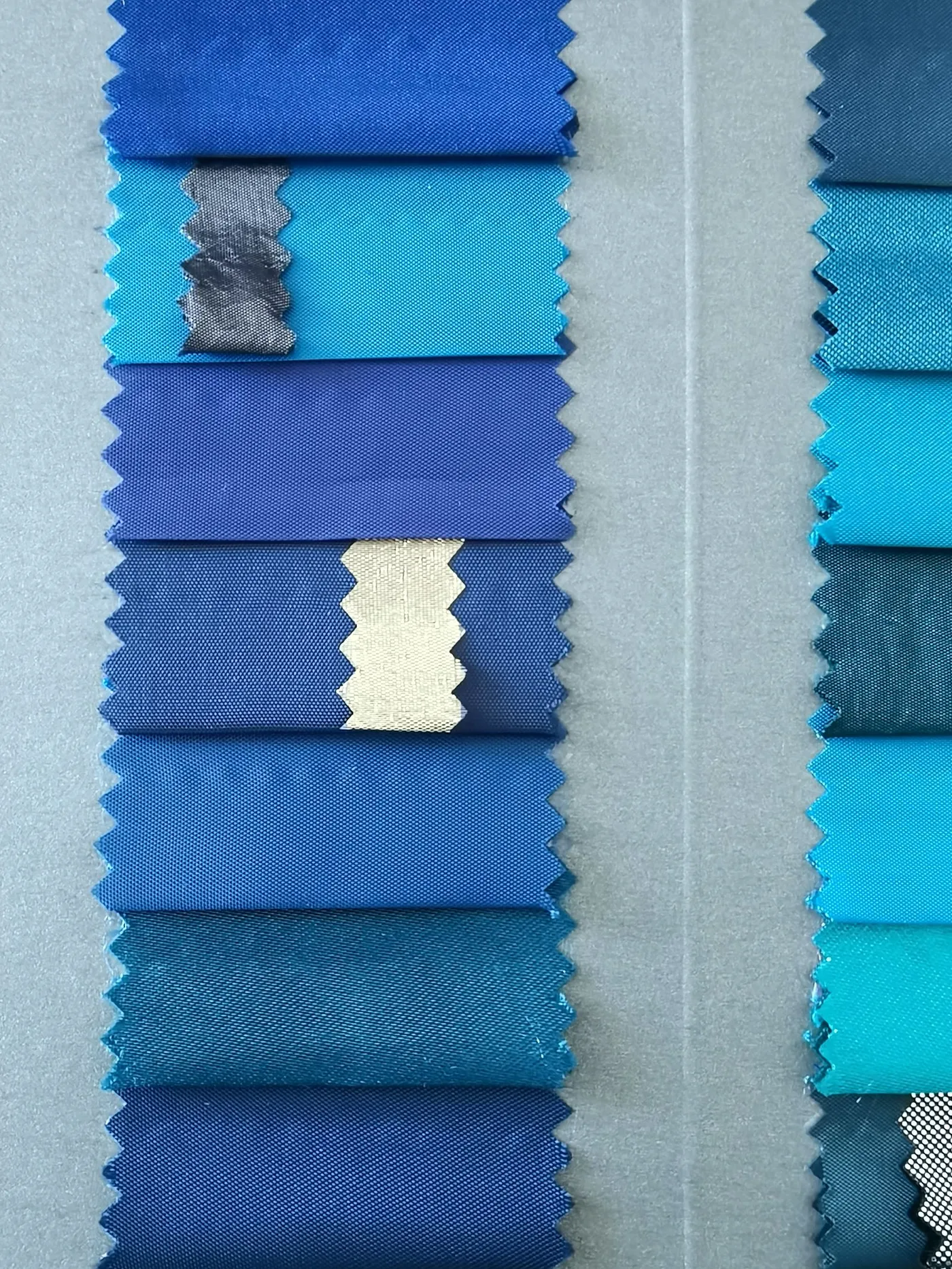 Fabric swatches showing different blue tones and textures
