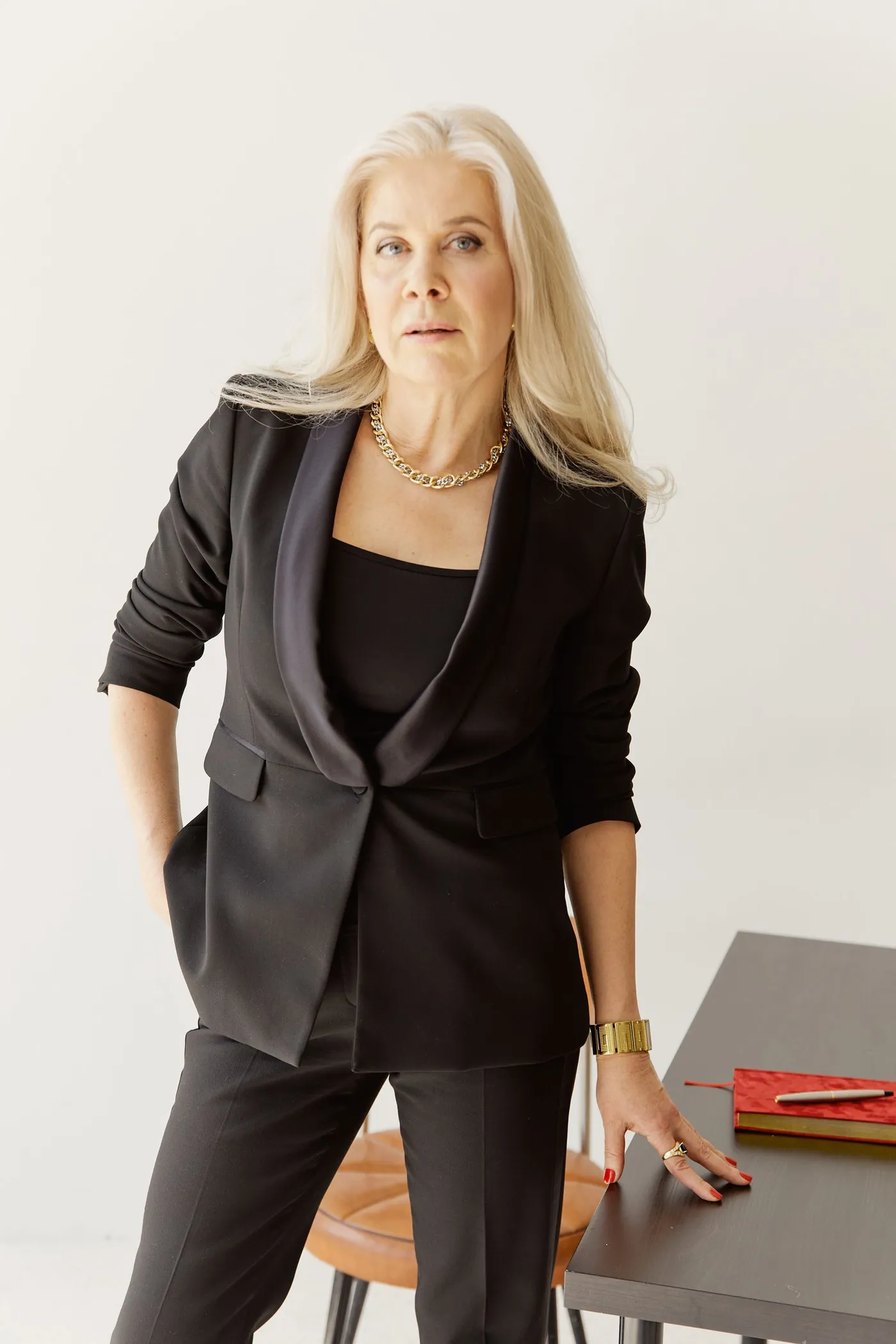 Woman wearing a black tailored business suit