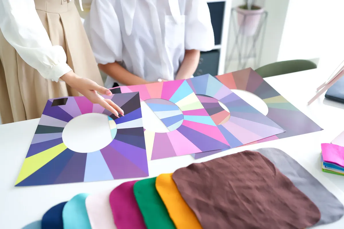 Colourful fabric samples spread across a table