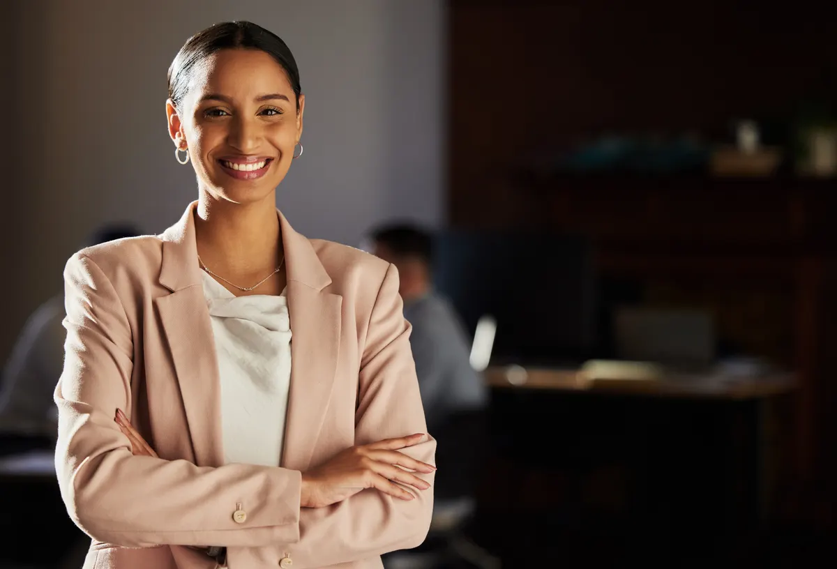 Woman wearing a softly tailored pale blazer