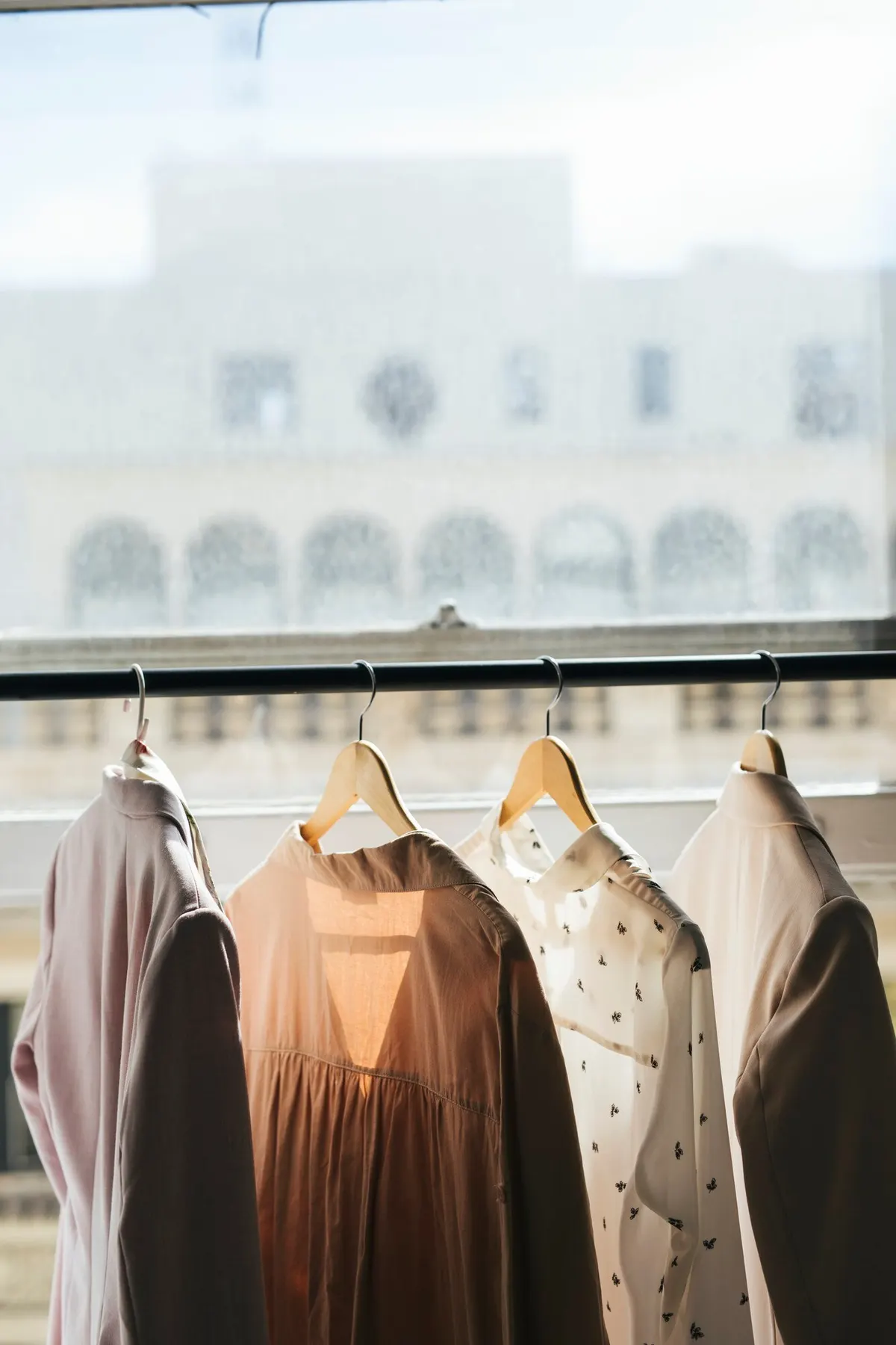 Textured outerwear arranged on a rail